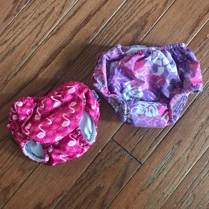 2 swim diapers 12 M - purple & pink w/ flamingos